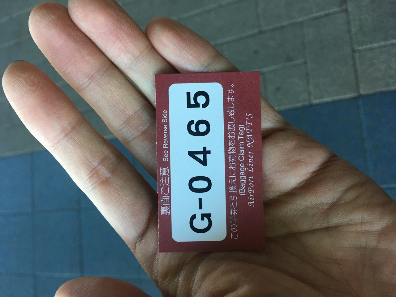 baggage tag showing G-0465